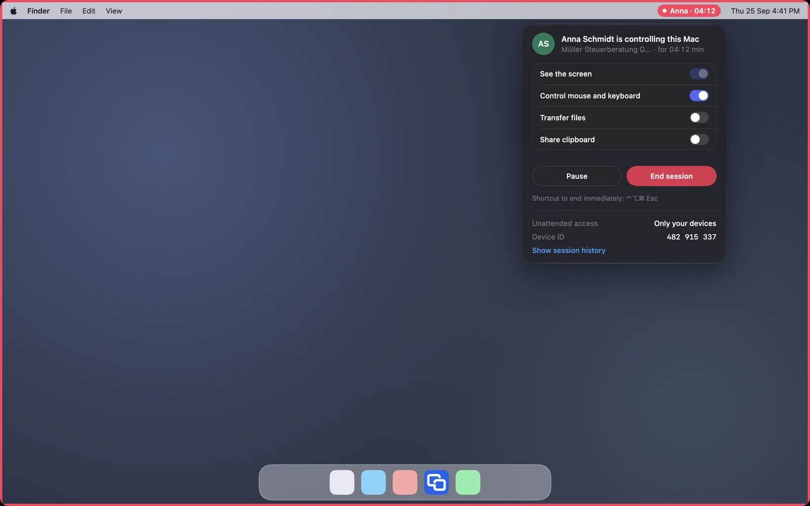 The Mac during a session: red menu bar indicator and red frame